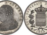 a close up of a coin with a crown on top of it