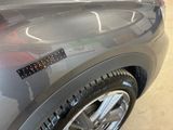 a close up of a car with a sticker on it