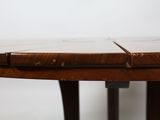 a close up of a wooden table with four pieces of wood on top of it