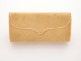 a beige clutch bag with a gold chain on a white background