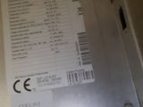 a close up of a metal box with a label on it