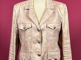 an image of a beige jacket on a mannequin mannequin mannequin mannequin mannequin mannequin mannequin mannequin