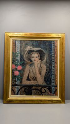 a painting of a woman in a hat on a wall