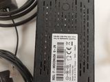 a charger that is connected to a charger with a cable
