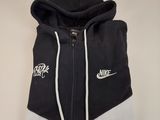 black and white nike hoodie with hoodie on top of it