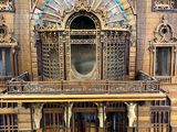 a wooden model of a building with a balcony and a balcony