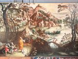 a picture of a painting on the wall of a room