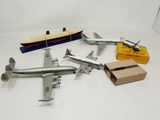 a lot of toy airplanes that are on the table