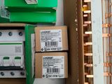 several boxes of electrical equipment are stacked on top of each other