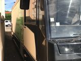 an image of a bus parked in a parking lot
