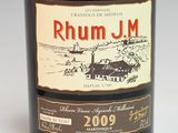 an image of a bottle of rum in front of a white background