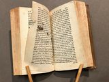 an open book that is sitting on top of a table