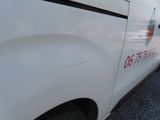 an image of a van parked on the side of the road