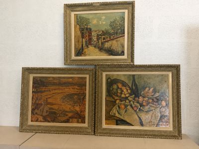 three paintings on a shelf in a room