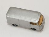 a silver toy van that is sitting on a white surface