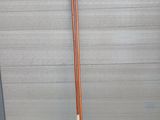 a pair of skis that are leaning against a wall