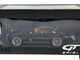 the box is black and has a black car inside of it