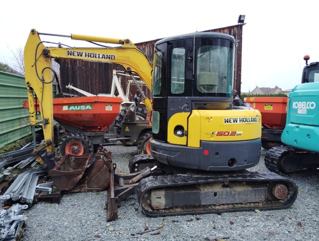 Mini pelle NEW HOLLAND E50 2 S R cabine, 5T. 6477 heures. Avec go...