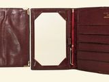 leather wallet with mirror and mirror in it on a white background