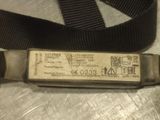 a belt that is attached to a knife on a table