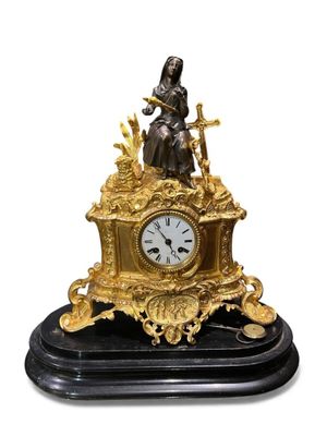 Pendule en bronze en double patine.
