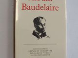 the book album baudelaire is on a white surface