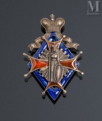 an image of a blue and silver medal with a crown on it