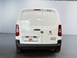 a white van that is parked in a room
