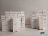 two stacks of white boxes stacked on top of each other