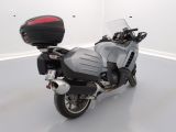a motorcycle that is parked in a white room