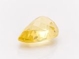 a yellow diamond on a white background