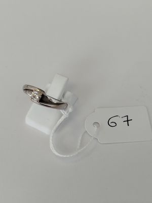 a close up of a ring with a price tag attached to it