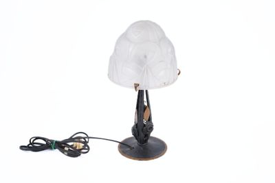 a lamp that is sitting on a table next to a charger