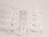 a lot of empty wine glasses sitting on a table