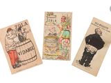 three old postcards with cartoon characters on them on a white surface