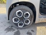 a close up of a tire on a car ' s rim