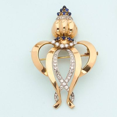 an image of a diamond and sapphire angel broochle