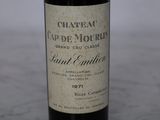 a bottle of wine that is sitting on a table