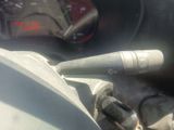 a microphone sitting on the dashboard of a car