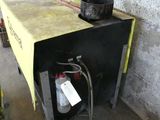an image of a gas stove in a garage