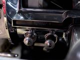 a close up of a car dashboard with a clock on it
