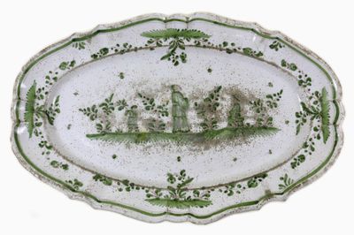 MONTAUBAN Grand plat oblong de forme chantournée en faïence …