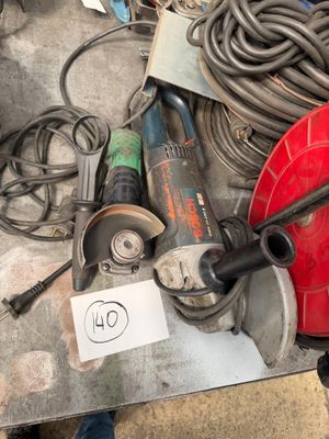 a lot of tools on a table with a price tag