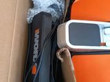 a box with a cell phone in it and a box with other items