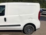a white van that is parked in a parking lot