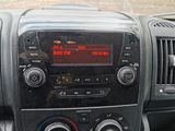 a dashboard of a car with a clock on it