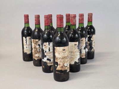 six bottles of wine are lined up in a row on a table