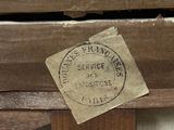 a piece of paper that has been placed on top of a piece of wood