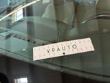 a sticker that says vauto on the windshield of a car