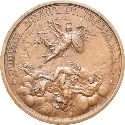 une image représentant une médaille de bronze sur laquelle figurent un homme à cheval et une femme à cheval